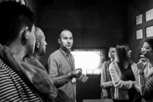 Krakow's guide Seweryn guiding in Schindler Factory